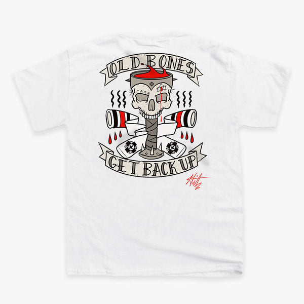 Back of a white tee: a tattoo-style skull on a nail between "Old Bones" and "Get Back Up" banners, signed "Hitz"