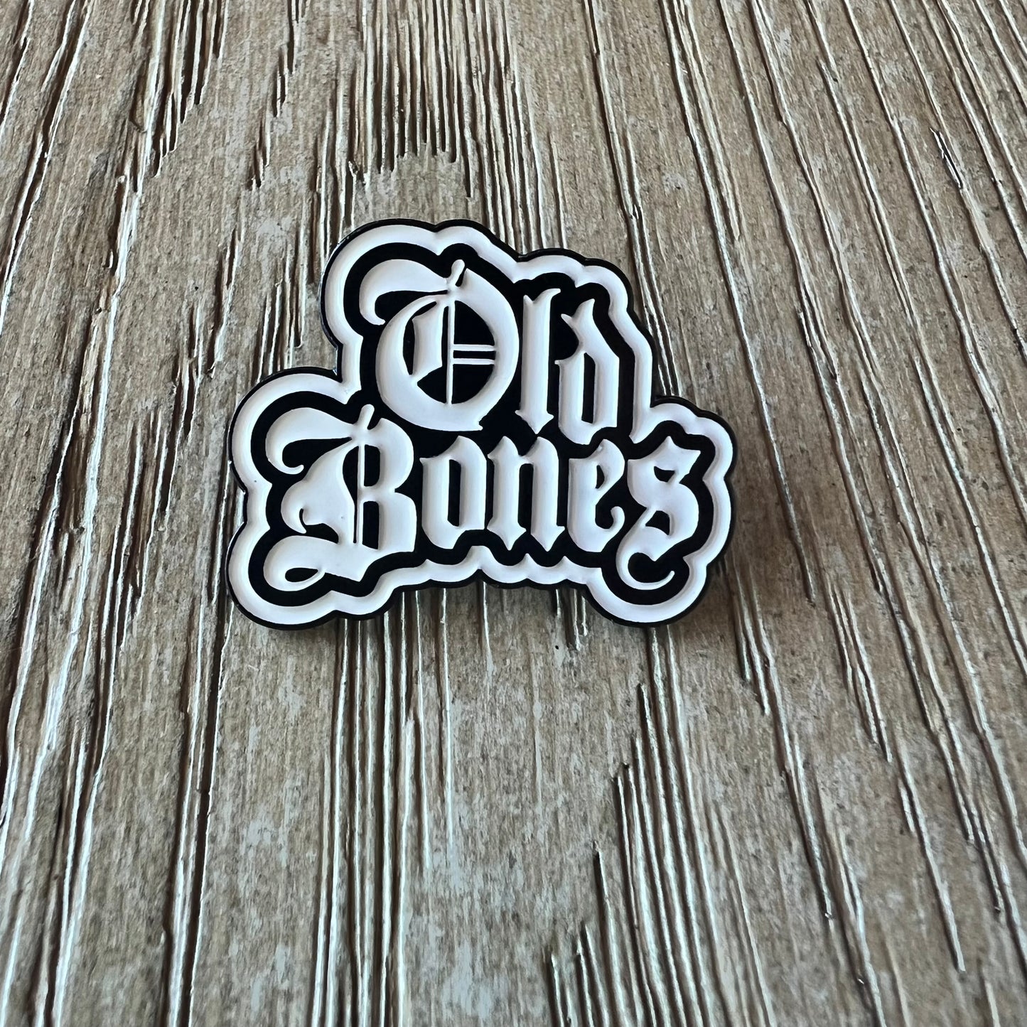 Old English Bones Enamel Pin