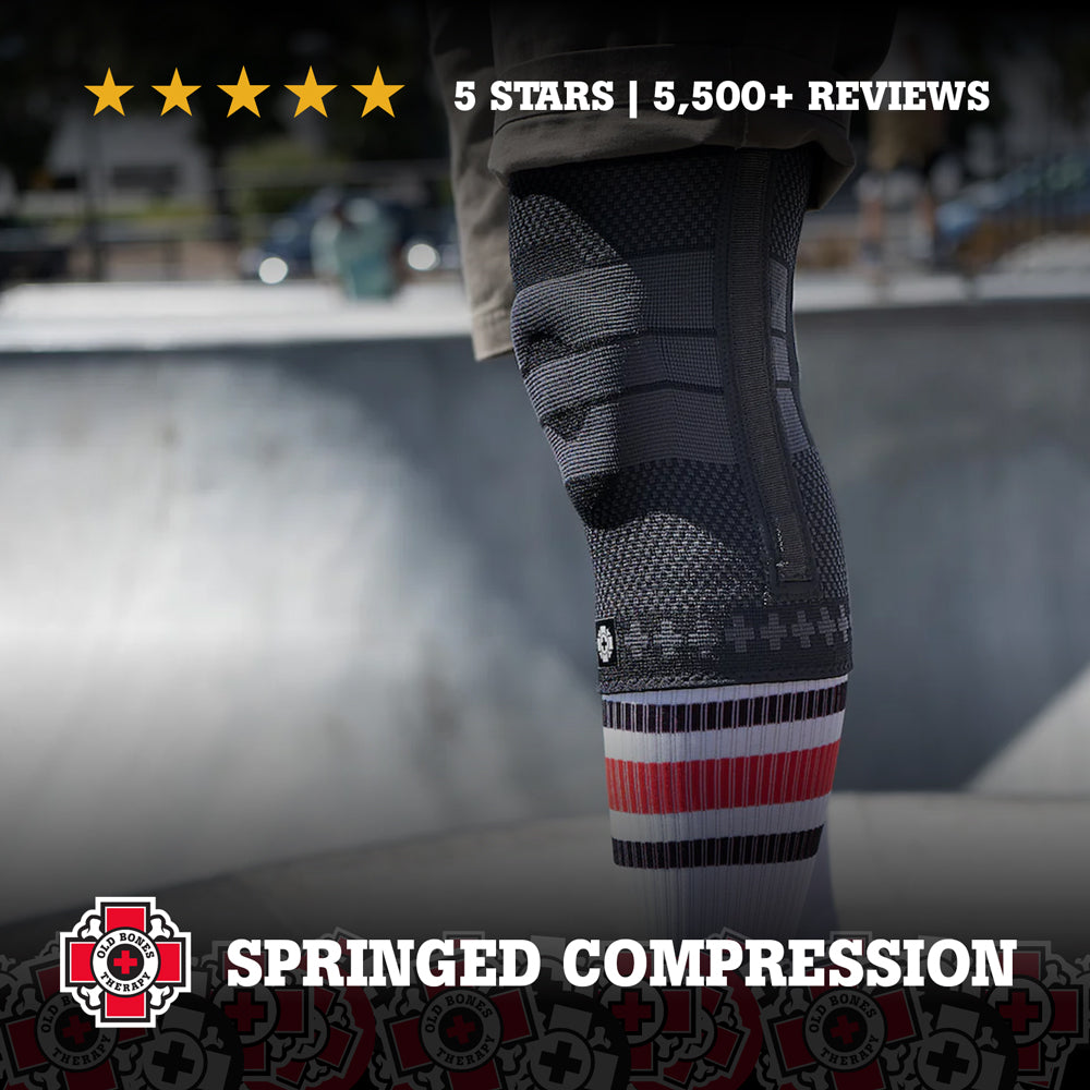Old Bones Therapy Spring-Loaded Knee Brace – Compression knee support with bilateral springs for stability, mobility, and active recovery